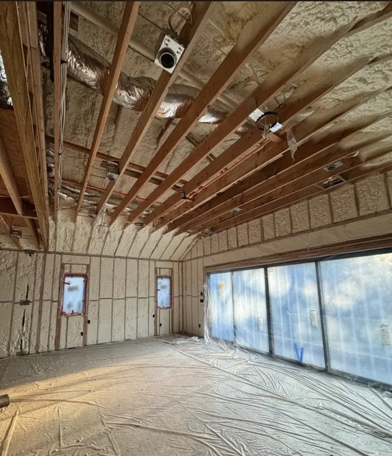 Interior walls and ceiling insulated with spray foam during new construction in Richmond